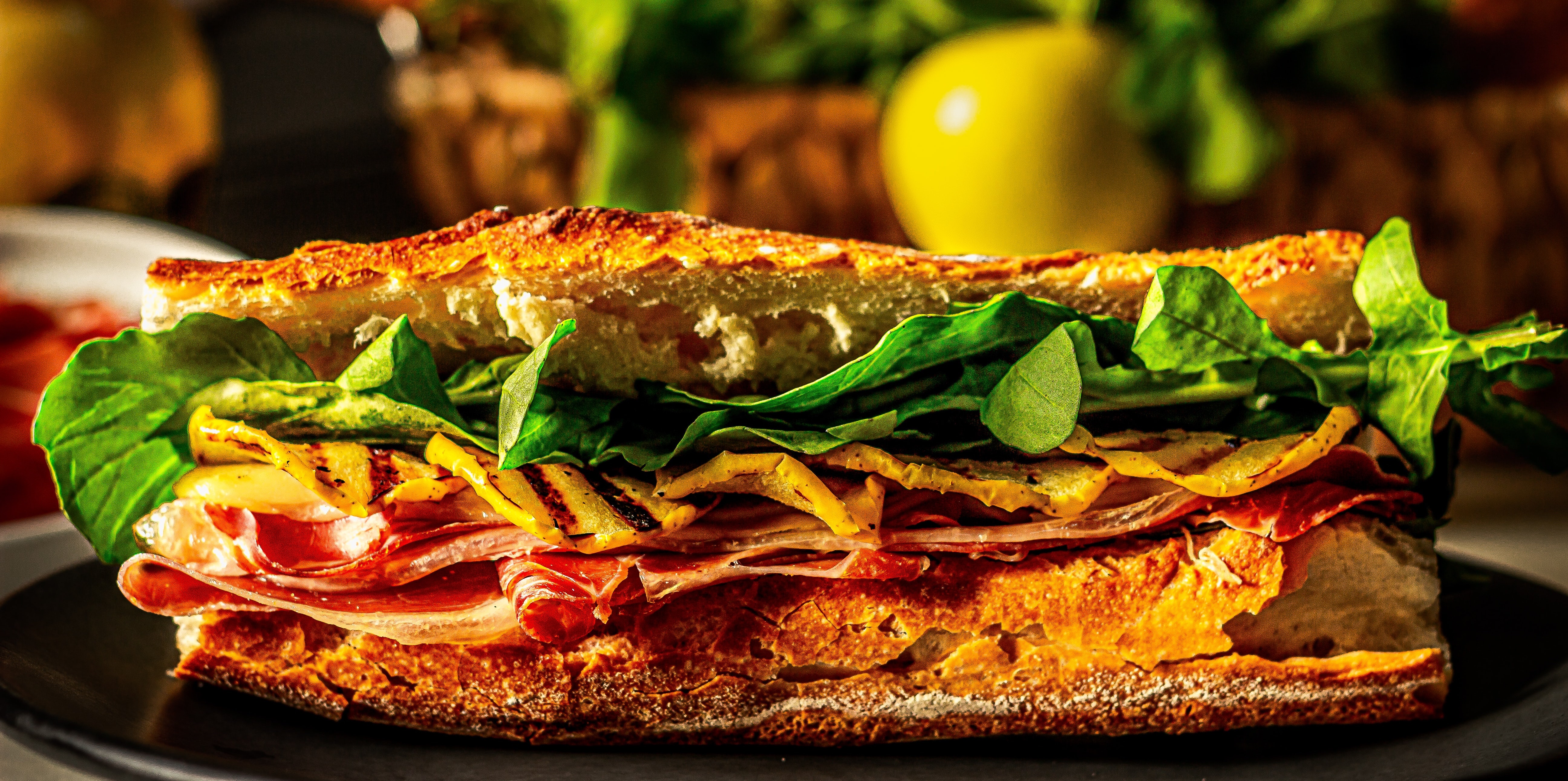 a sandwich cut in half on a plate