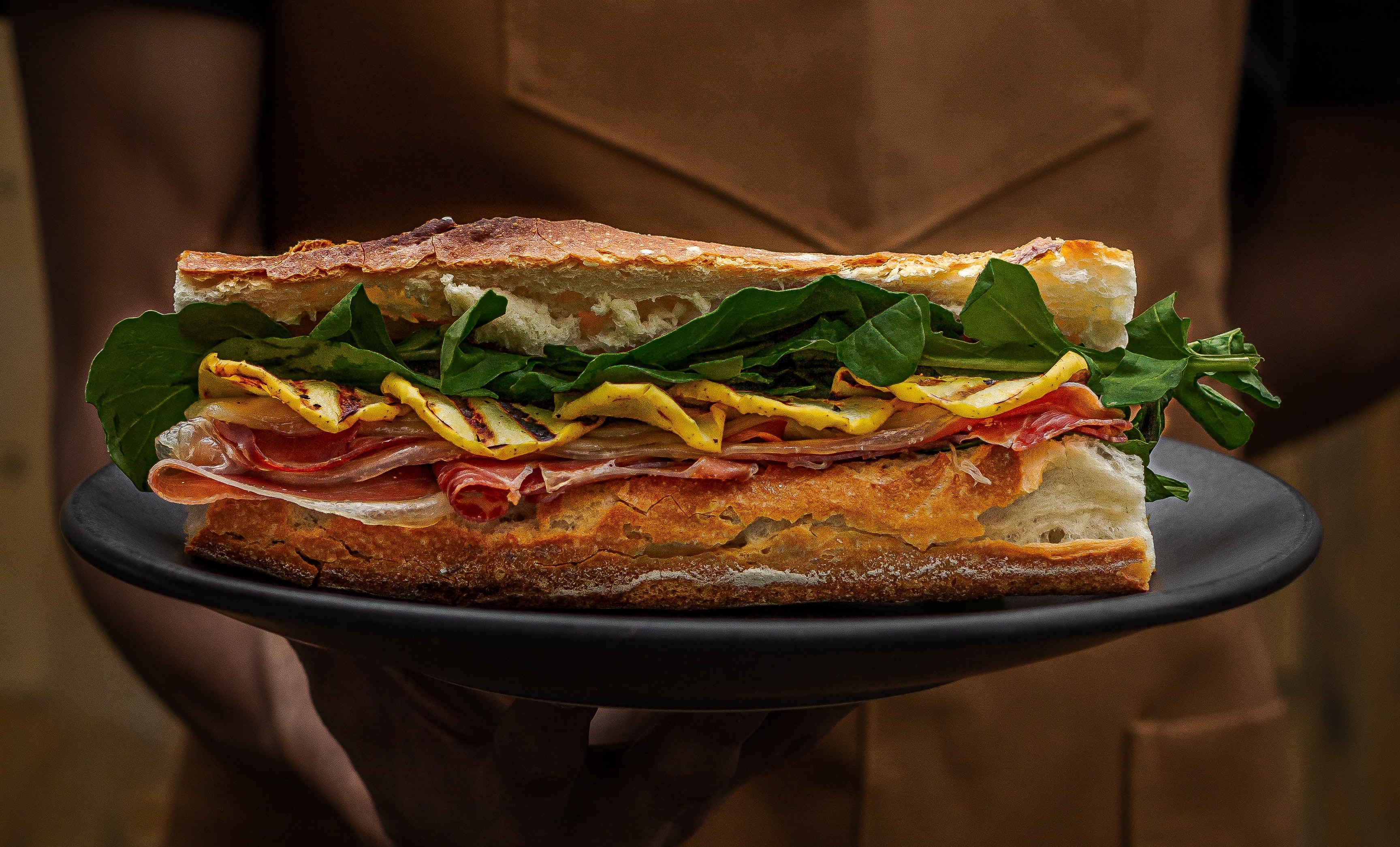 a close up of a sandwich sitting on top of a table