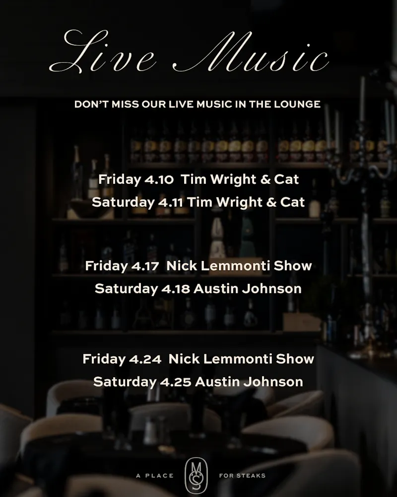 a live music event with a bar and chairs