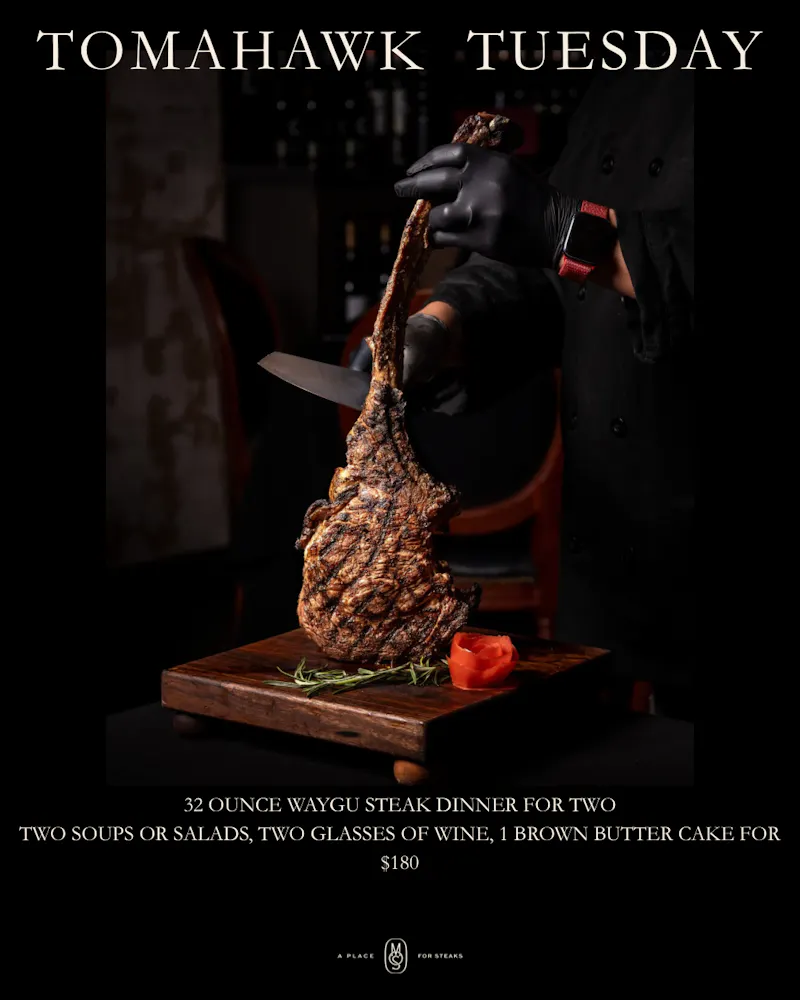 a person holding a piece of meat