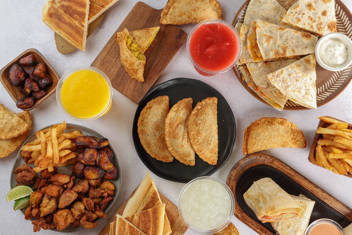 Food photo, empanadas, chicken quesadilla, chicken wrap, chicken sandwich, fried chicken bites, hamd and cheese toast