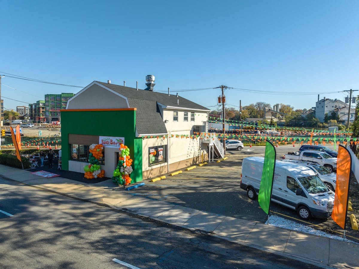 a train is parked on the side of a road