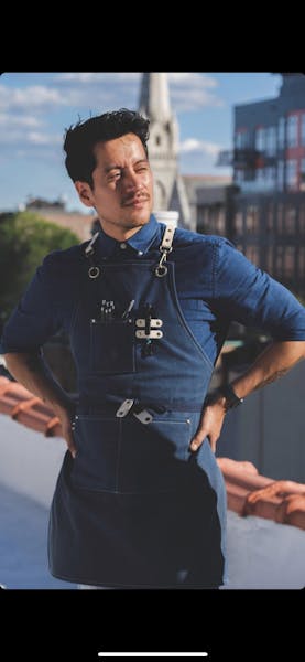 a man in a blue shirt