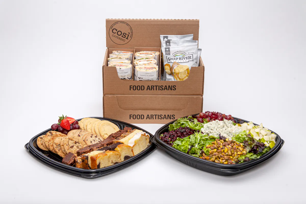 A Cosi box lunch with a salad and a dessert