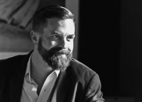 a man wearing a suit and tie