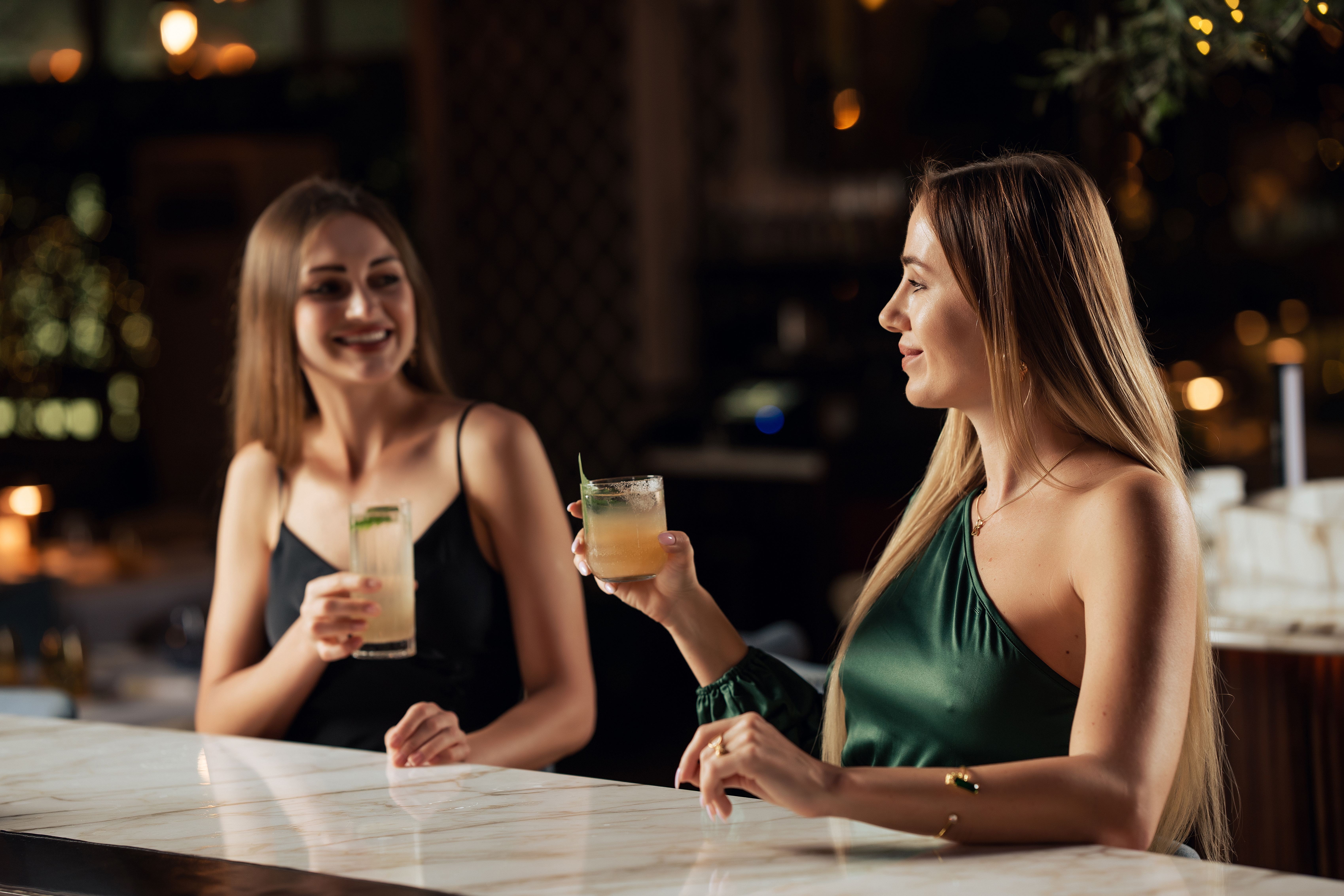 a couple of girls drinking