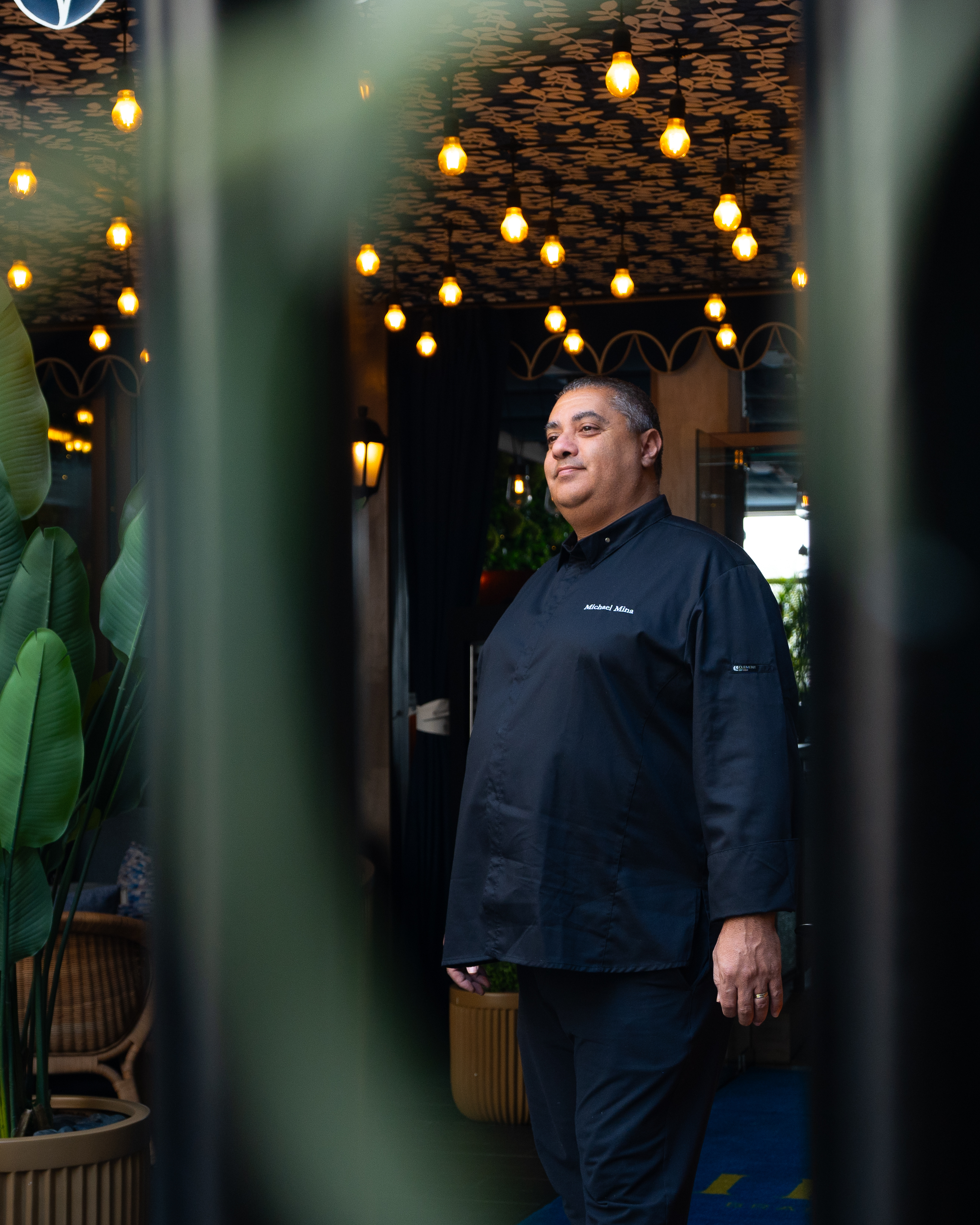 a chef wearing black shirt