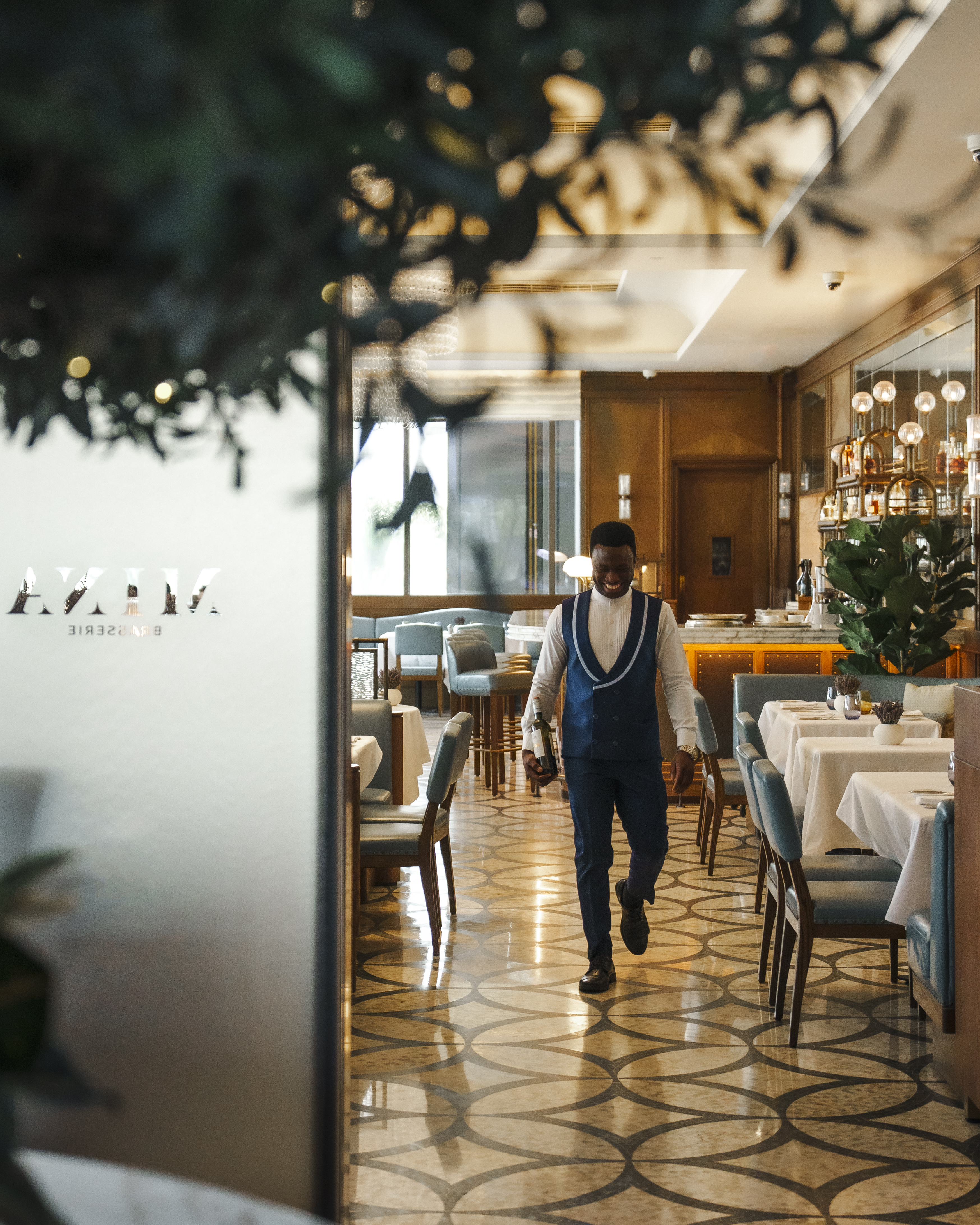 a man walking through a restaurant