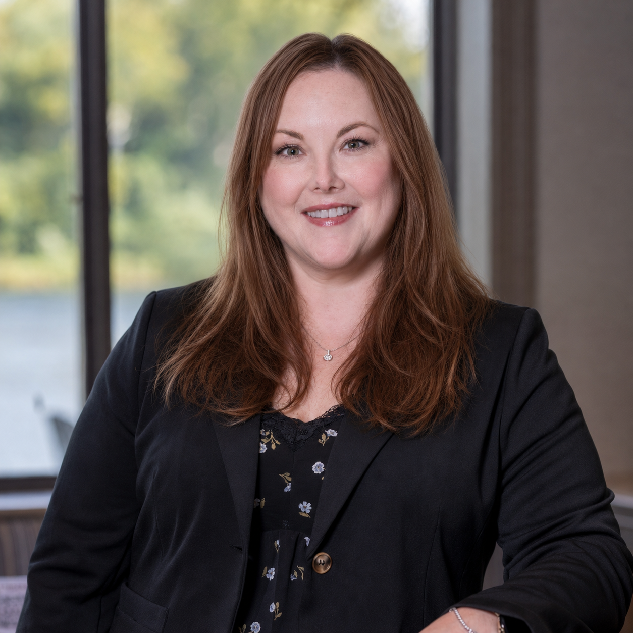a woman in a black suit