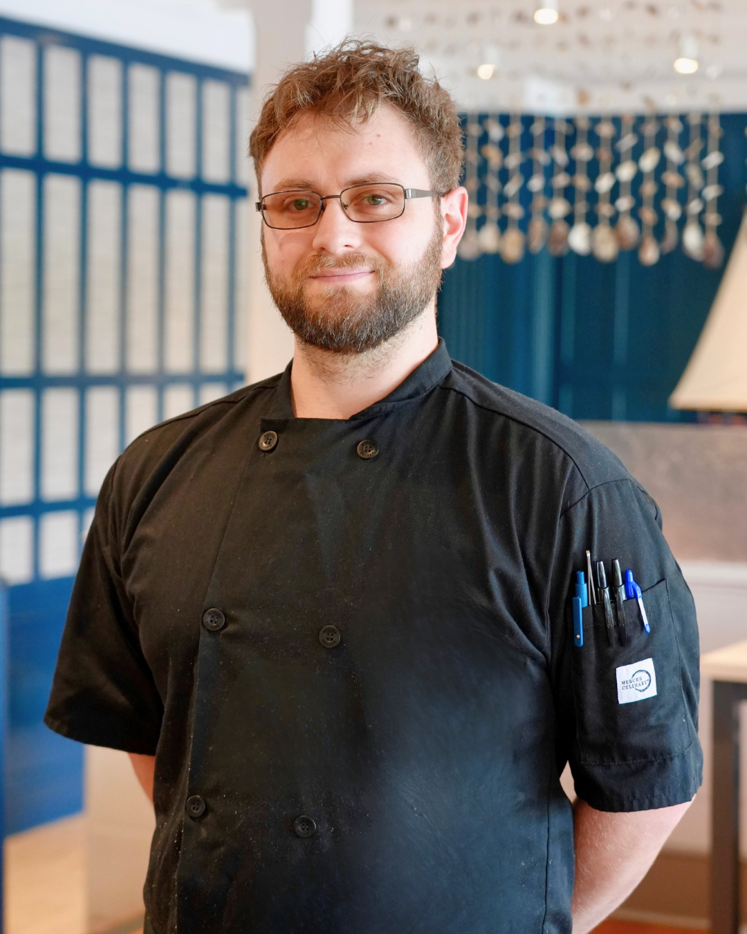 a man wearing a black shirt