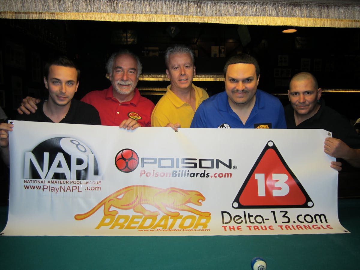 a group of people posing for the camera