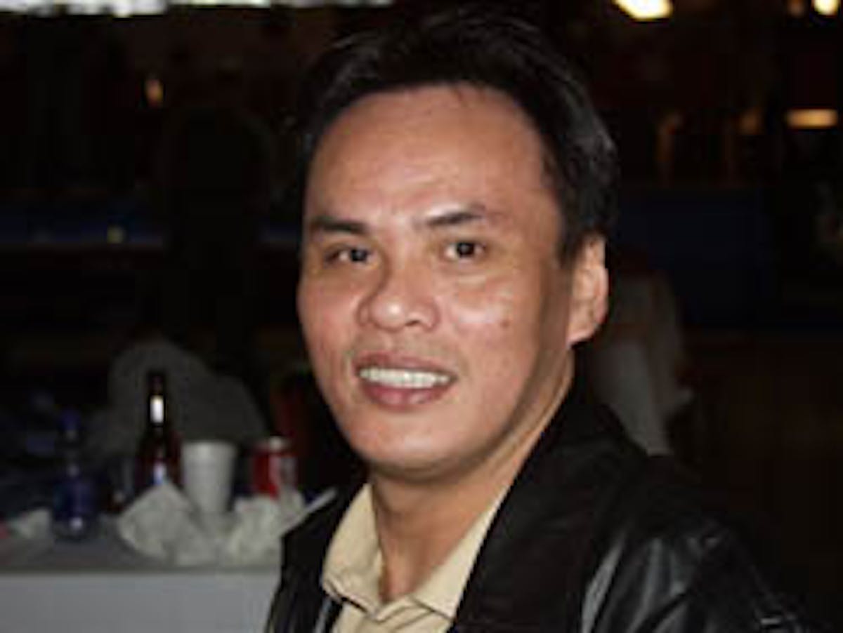 Francisco Bustamante smiling for the camera