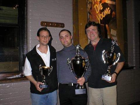 Allen Hopkins et al. holding wine glasses
