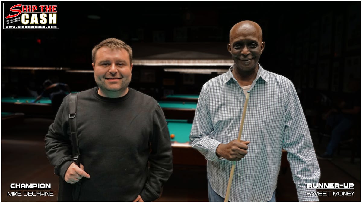 a person standing posing for the camera