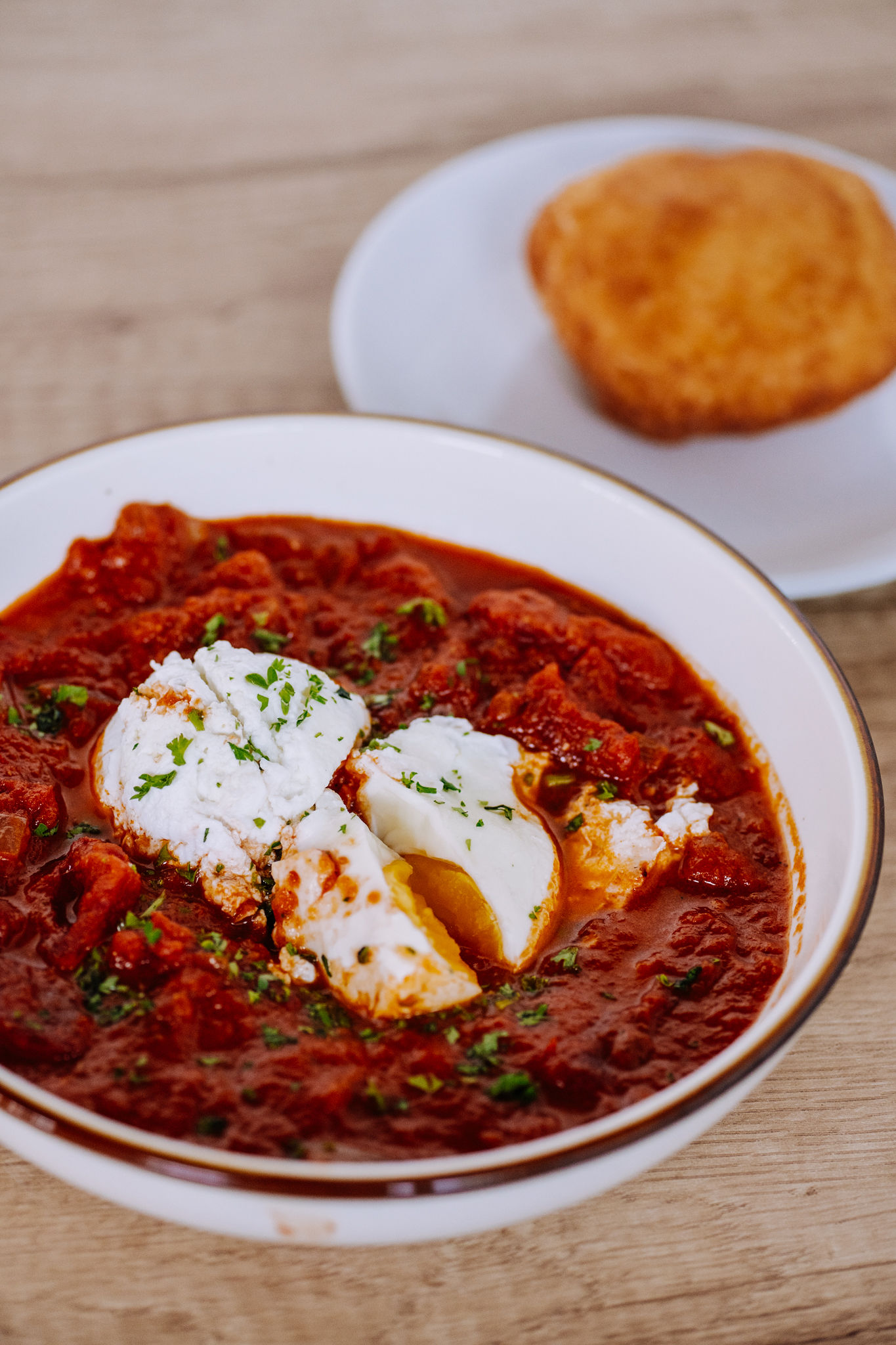 a pizza sitting on top of a plate of food