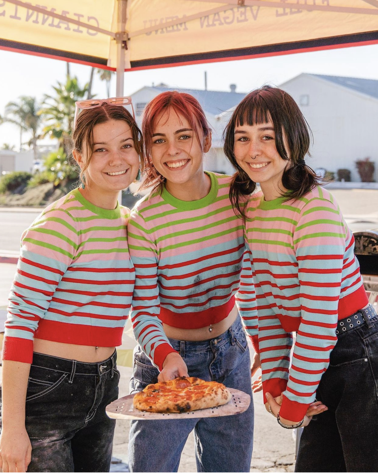 a group of people posing for the camera