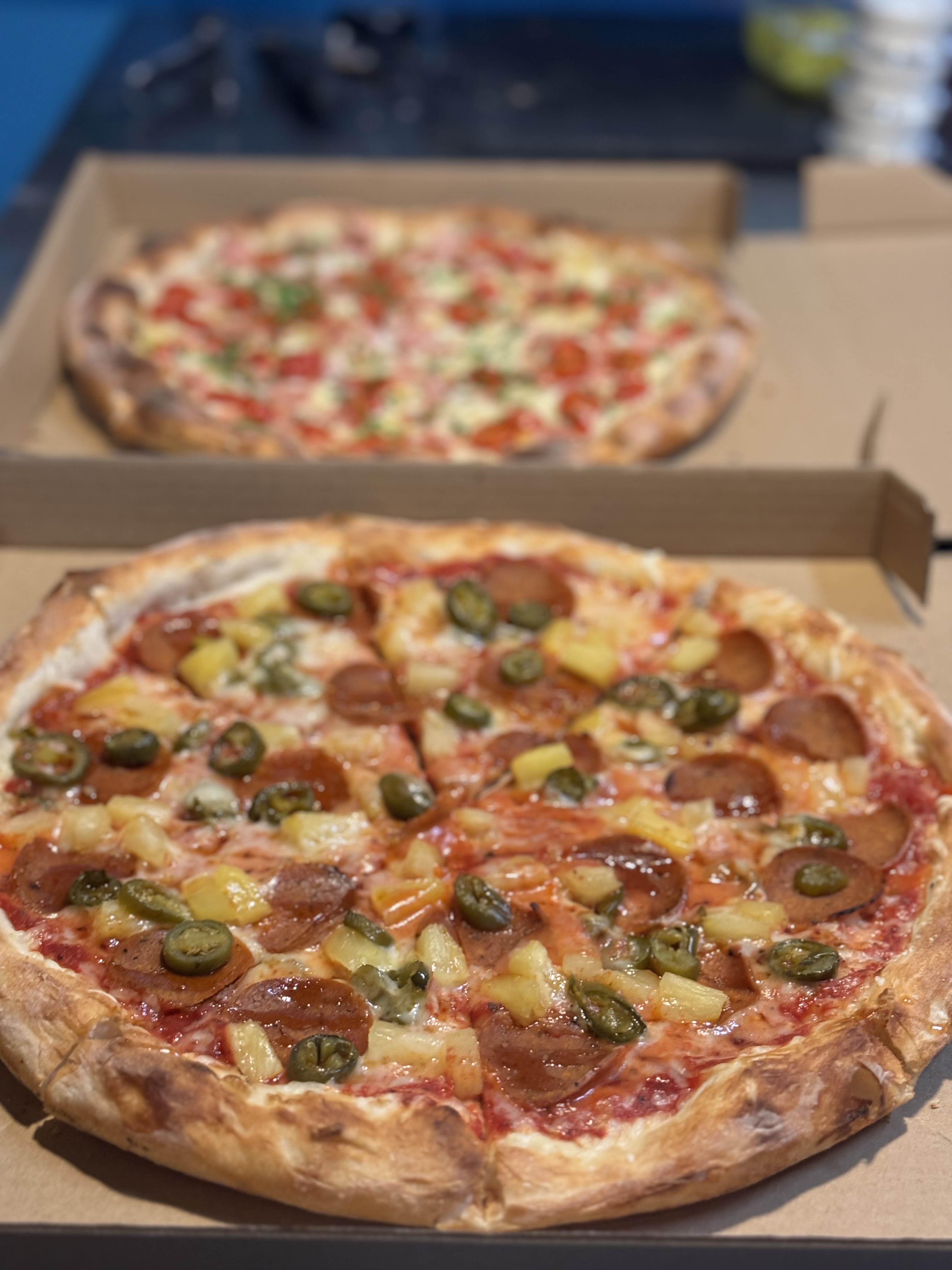 a pizza sitting on top of a table