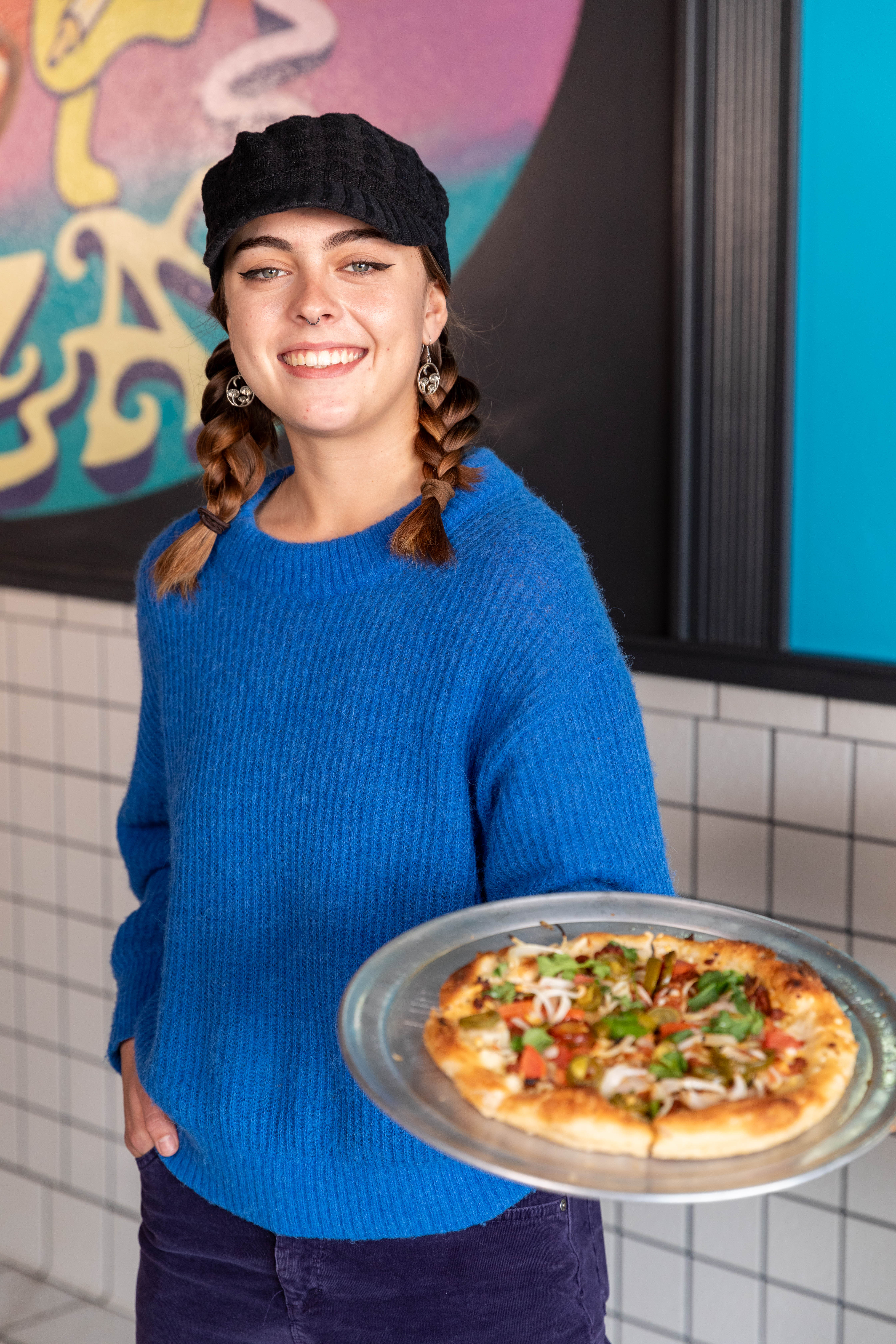 a woman in a blue shirt
