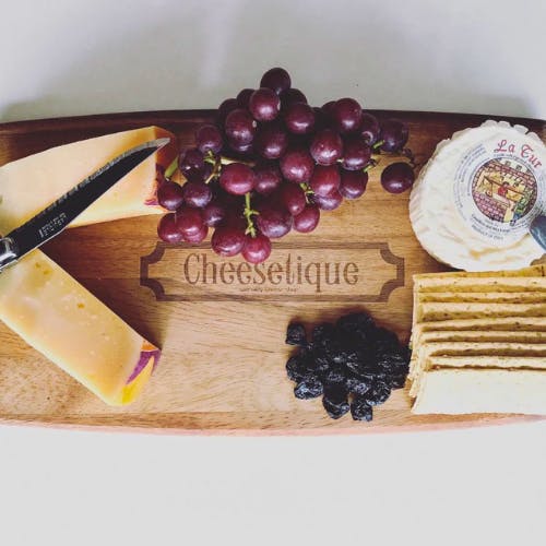 a piece of cake sitting on top of a cutting board