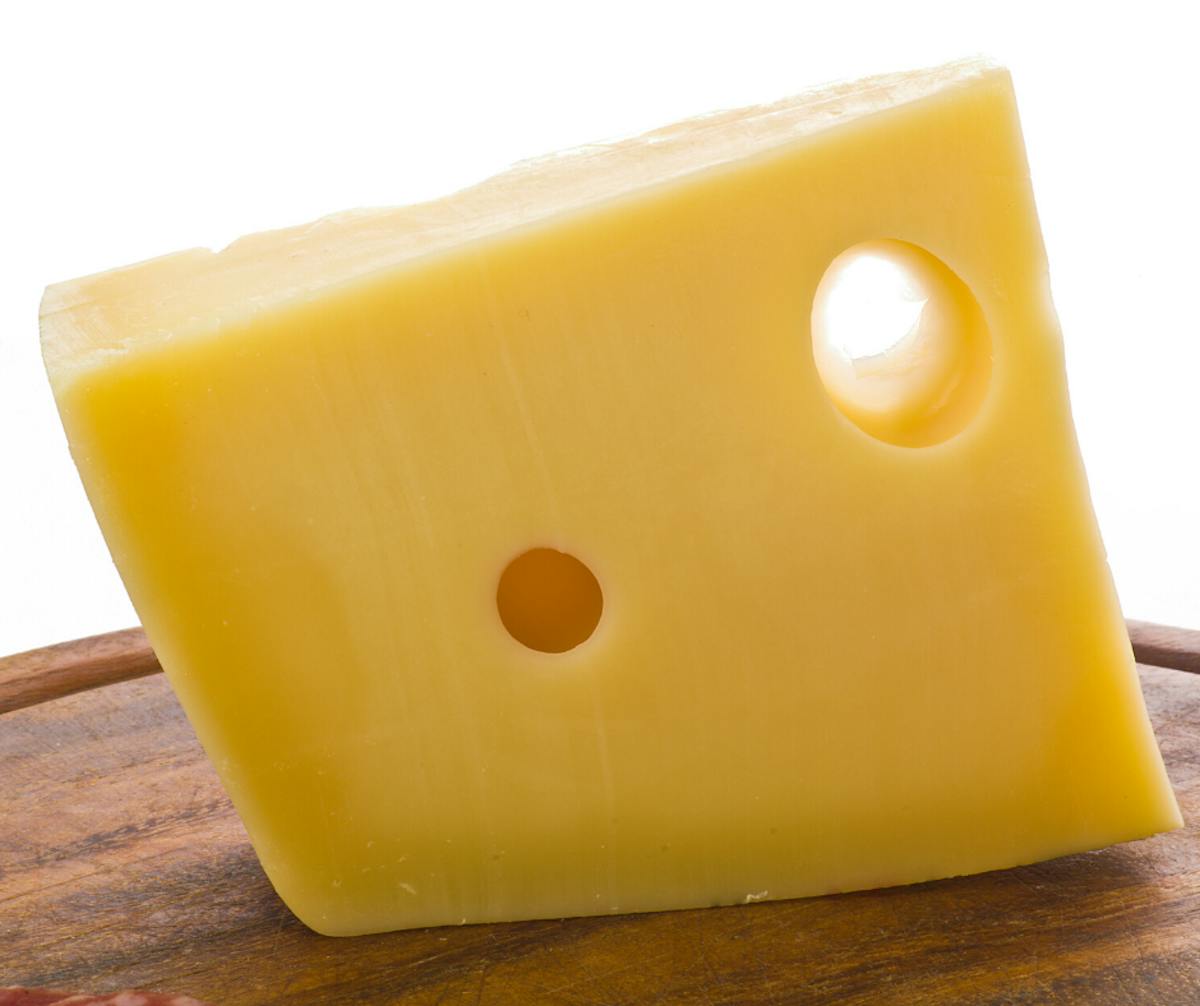 a black and yellow cheese