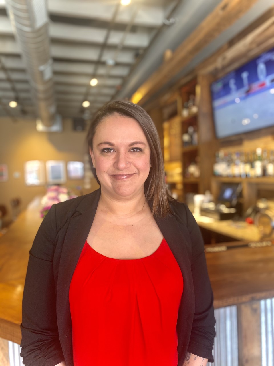 a woman smiling for the camera