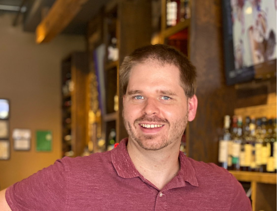 a man smiling for the camera