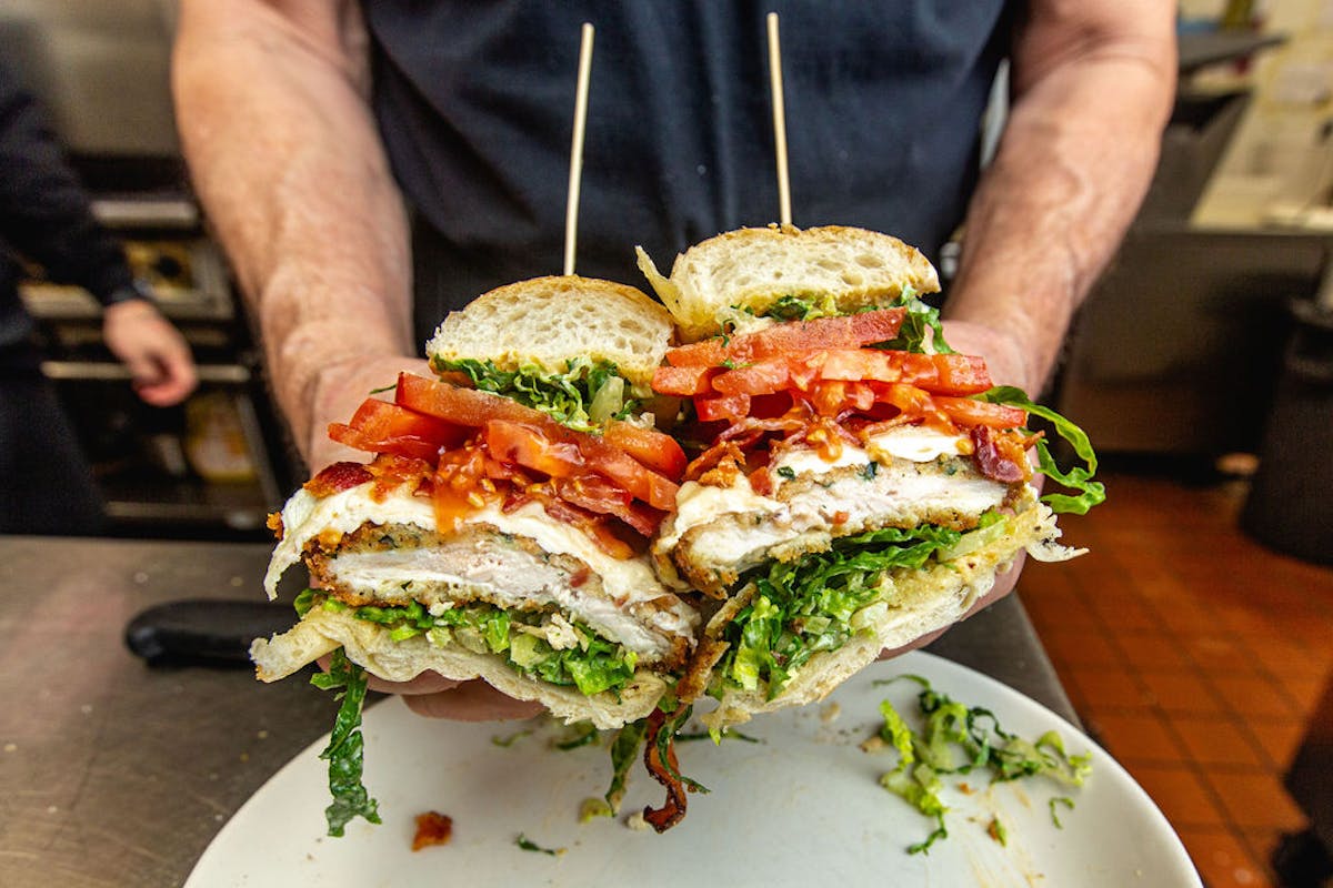 a sandwich cut in half on a plate