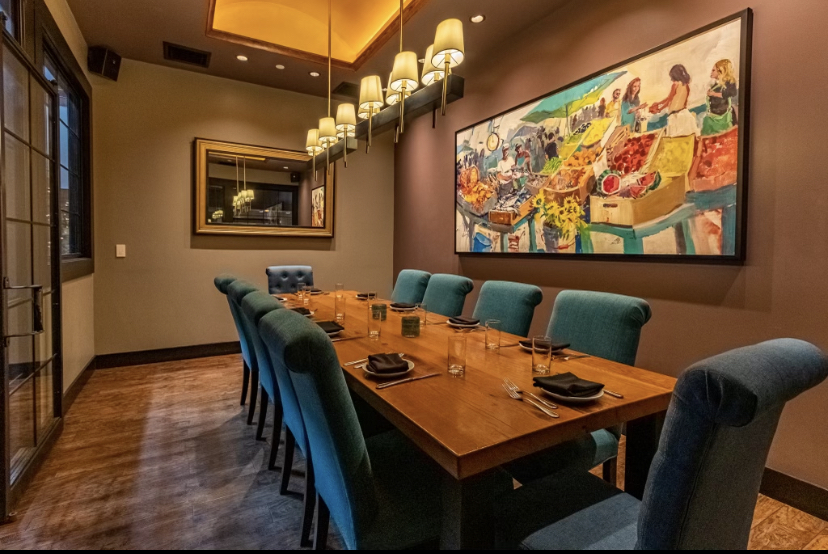 a living room with a couch and a table