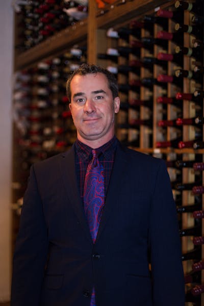 a man wearing a suit and tie