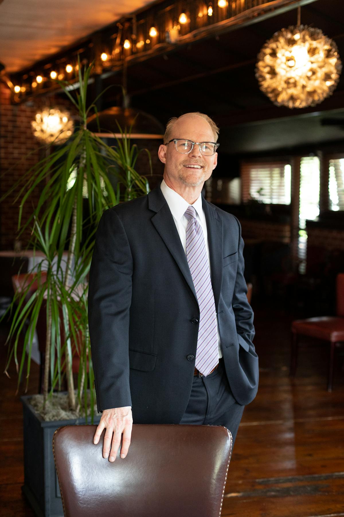 a man wearing a suit and tie