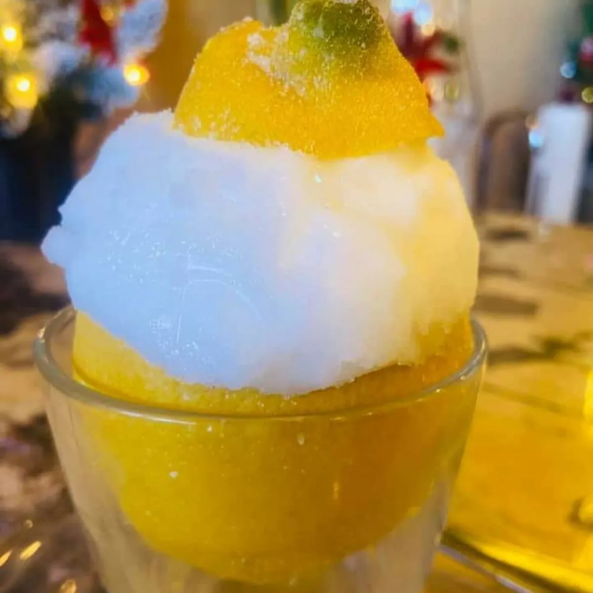 a close up of a glass of orange juice
