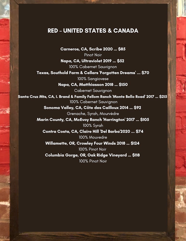 a close up of text on a brick wall