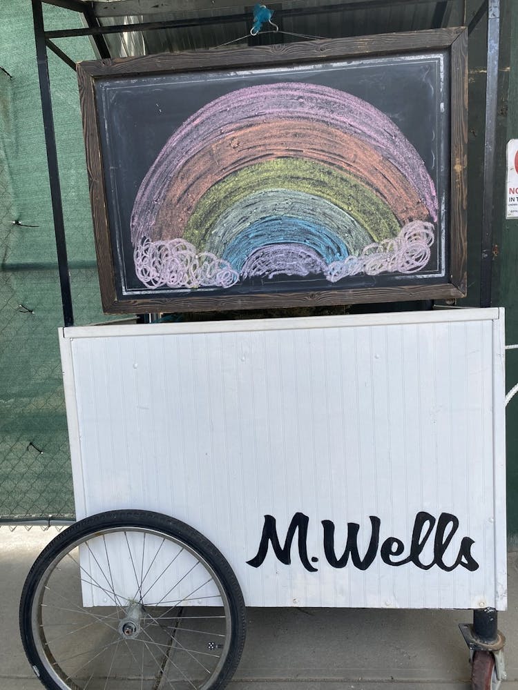 a bicycle parked on the side of a building