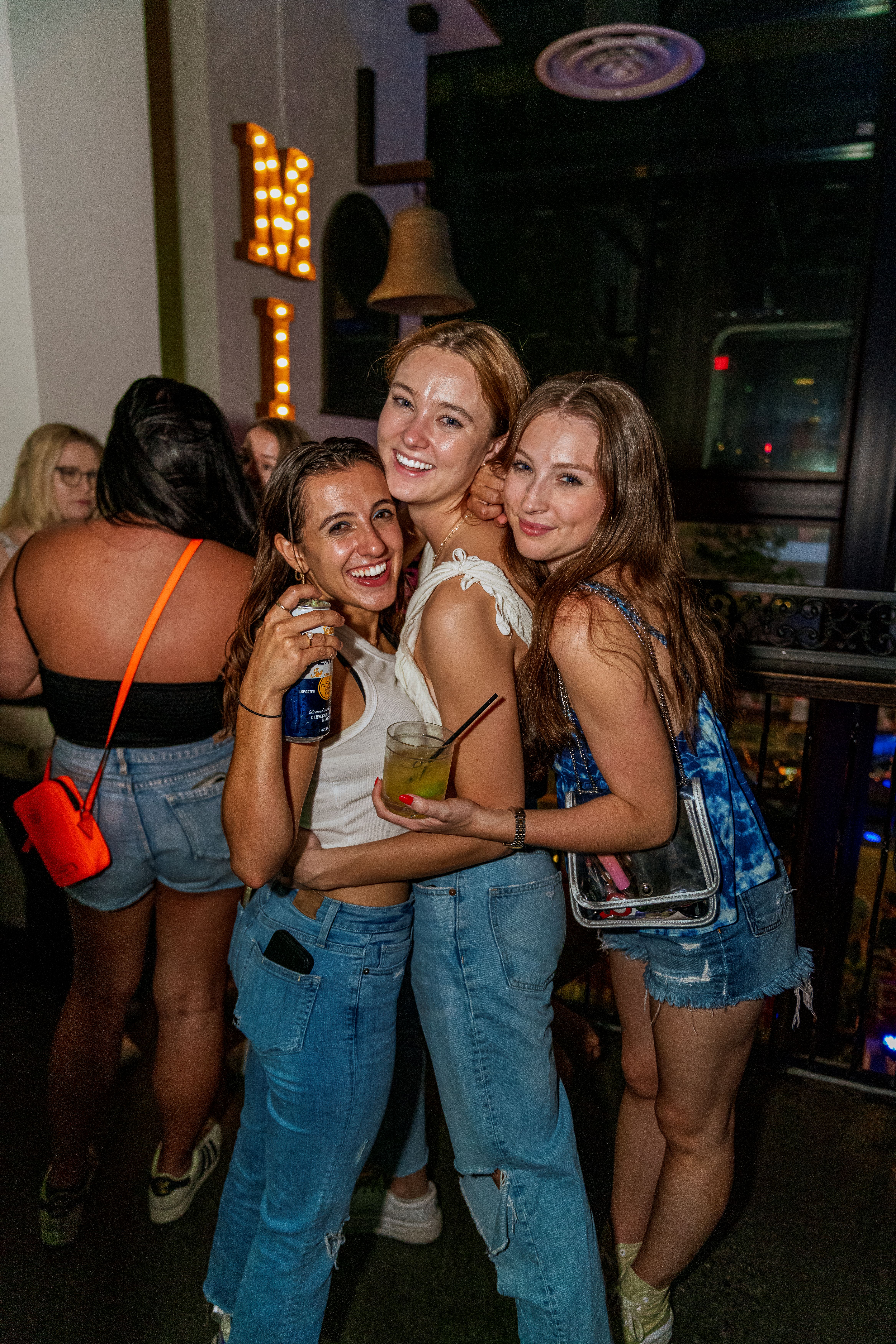 a group of people posing for the camera