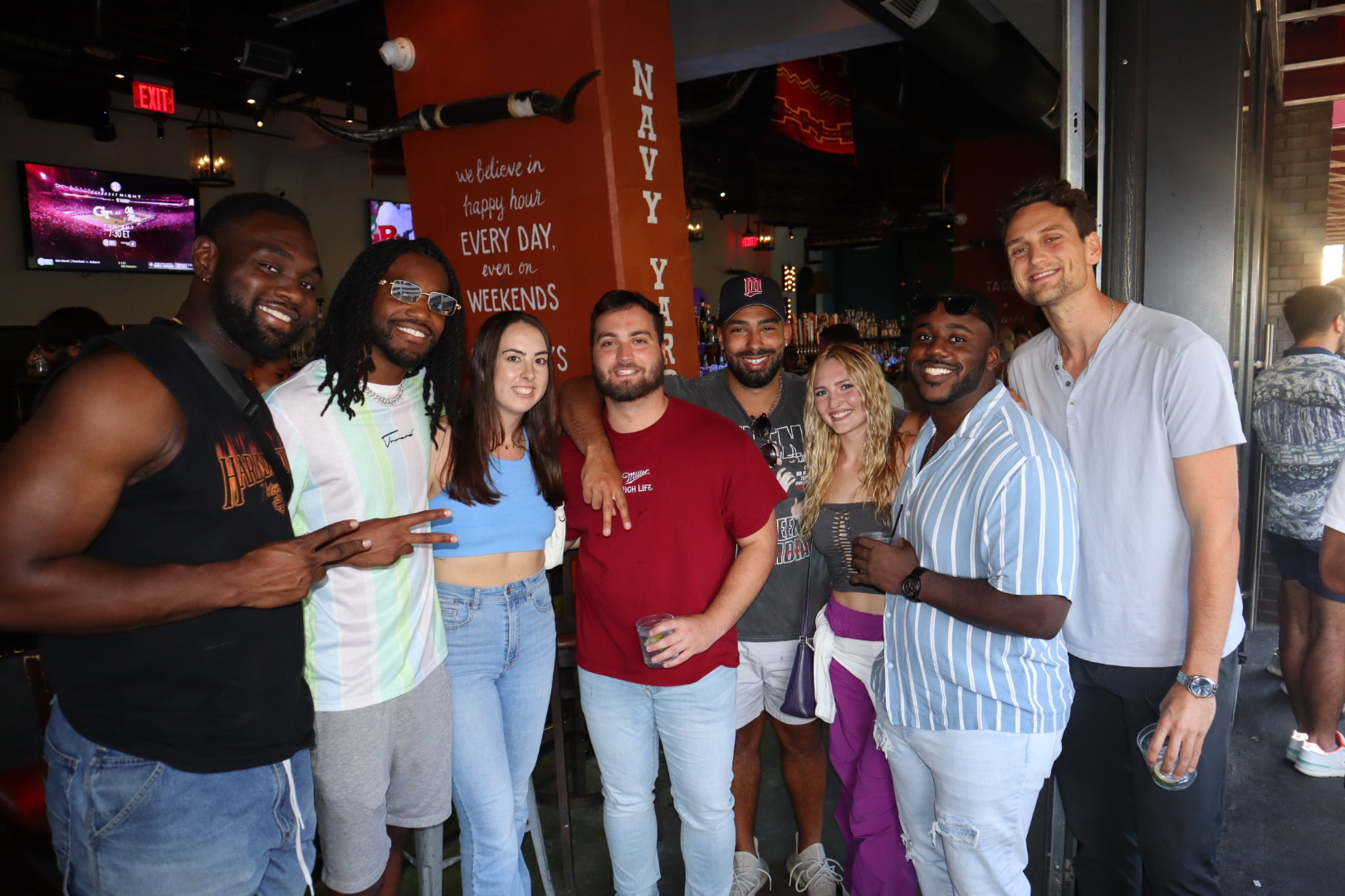 a group of people posing for the camera