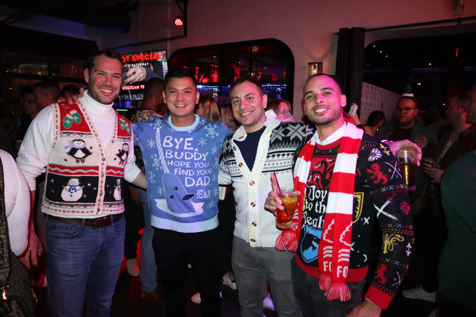a group of people posing for the camera