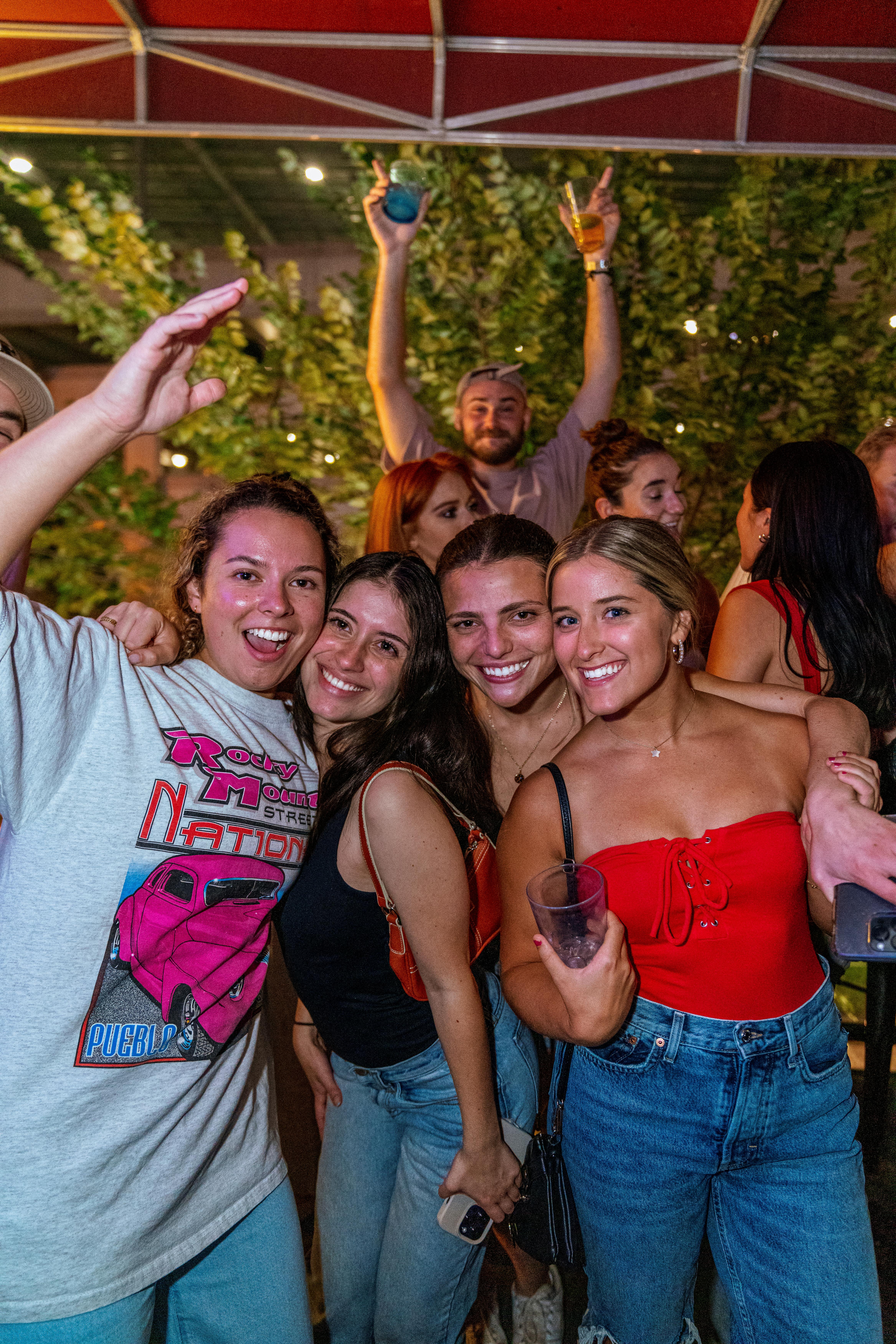 a group of people posing for the camera