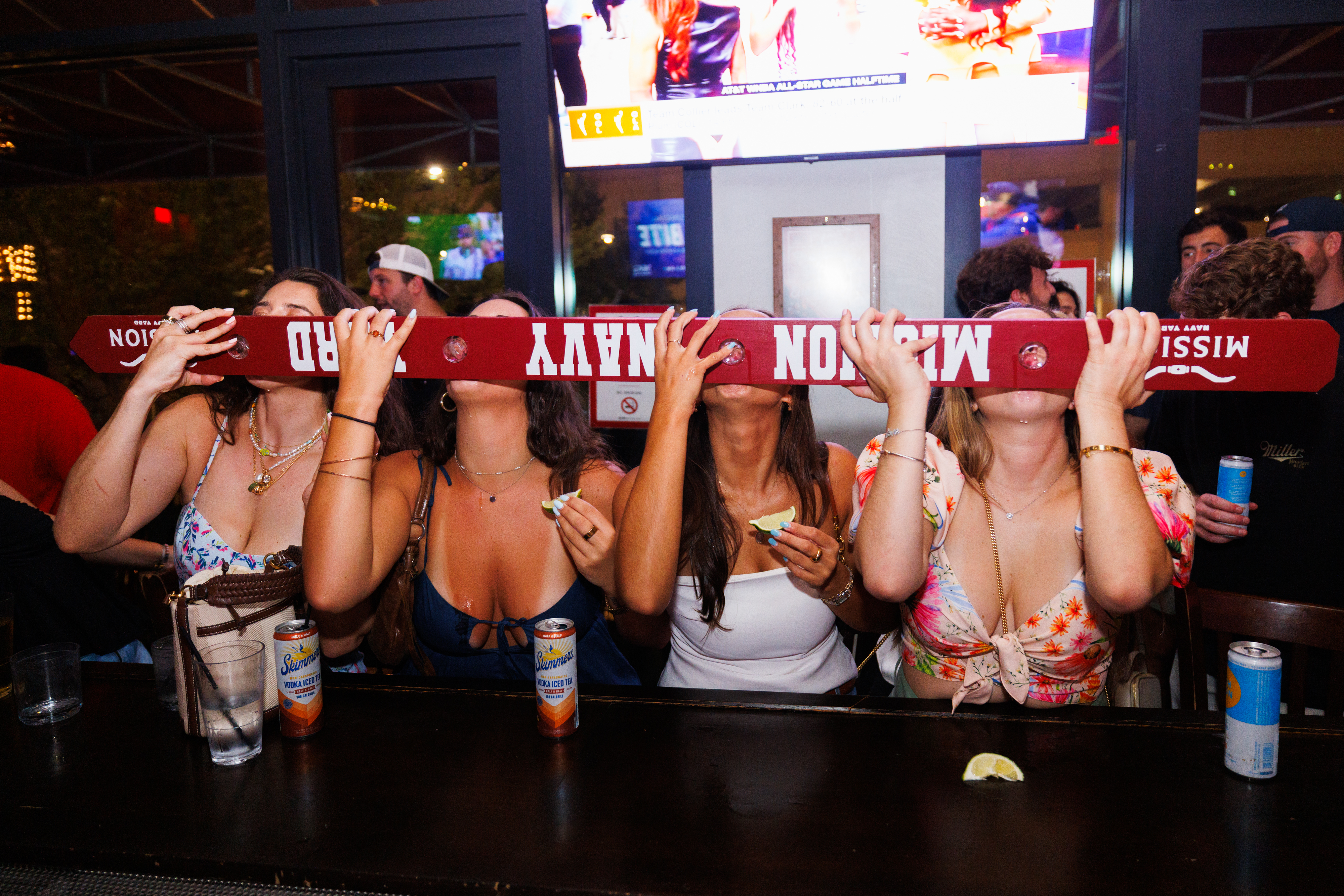 a group of people sitting at a table