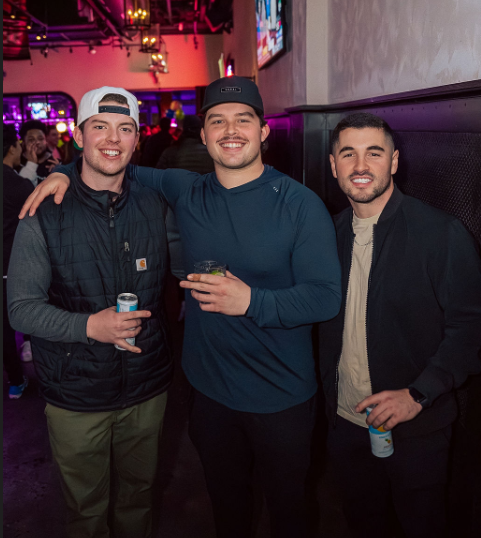 a group of people posing for a photo