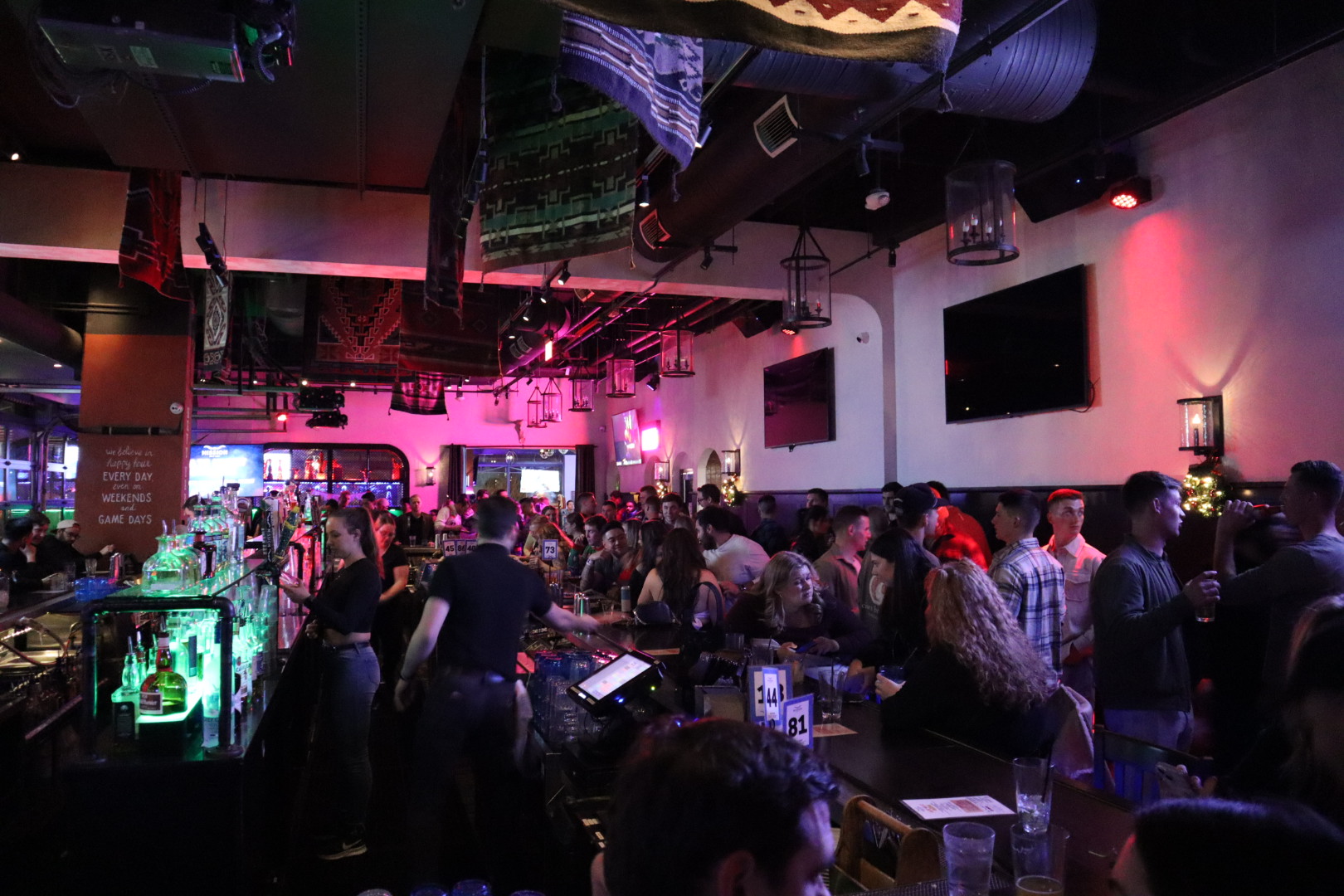 a group of people standing in front of a crowd