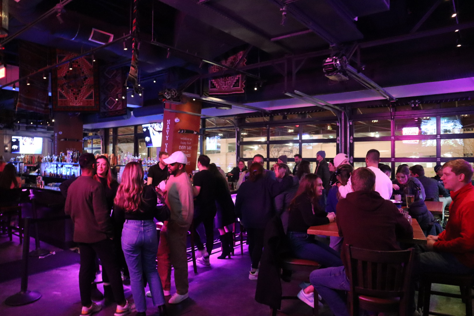 a group of people standing in front of a crowd