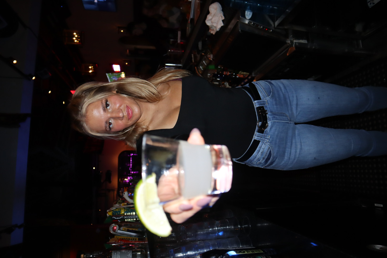 a woman holding a wine glass