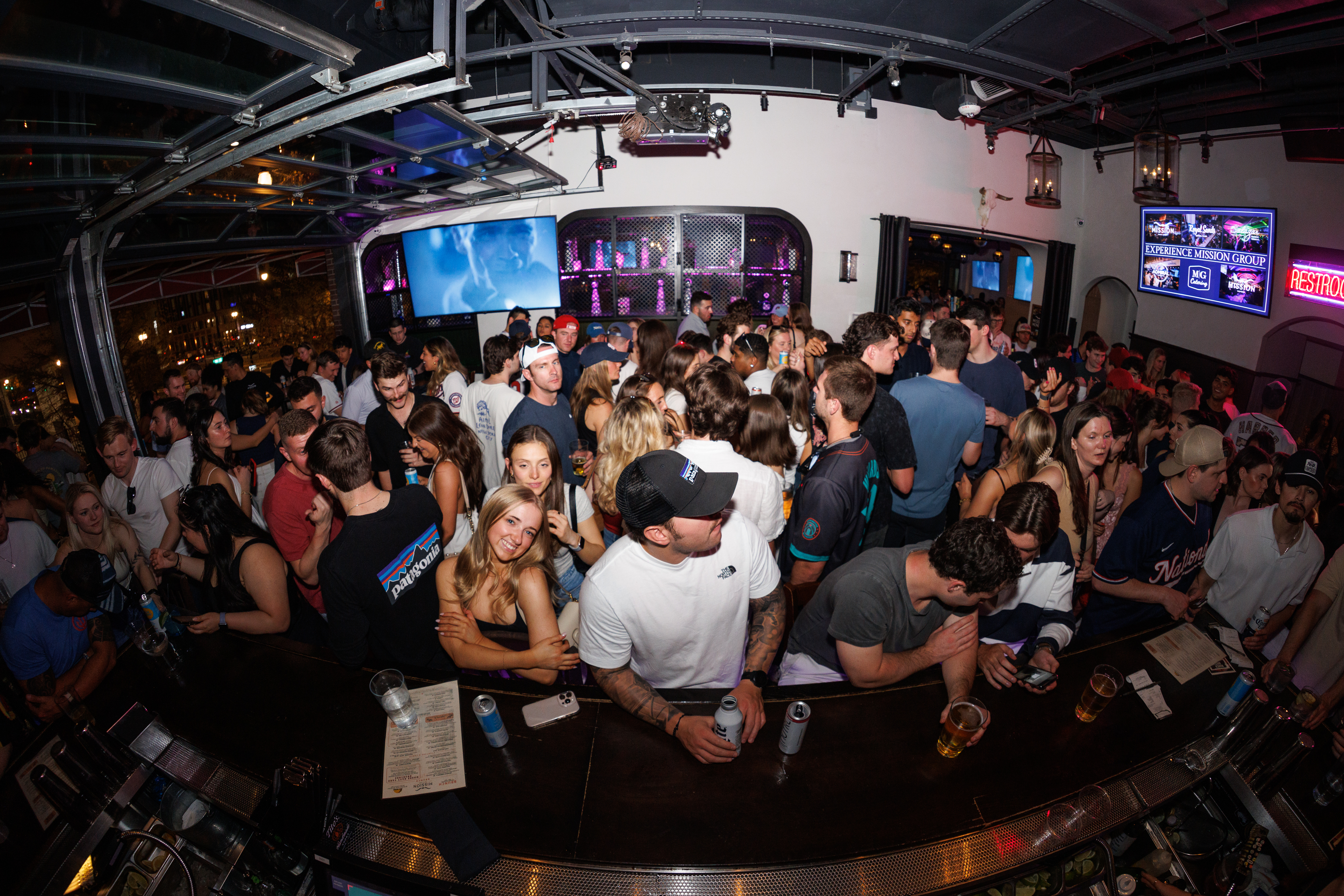 a group of people standing in front of a crowd