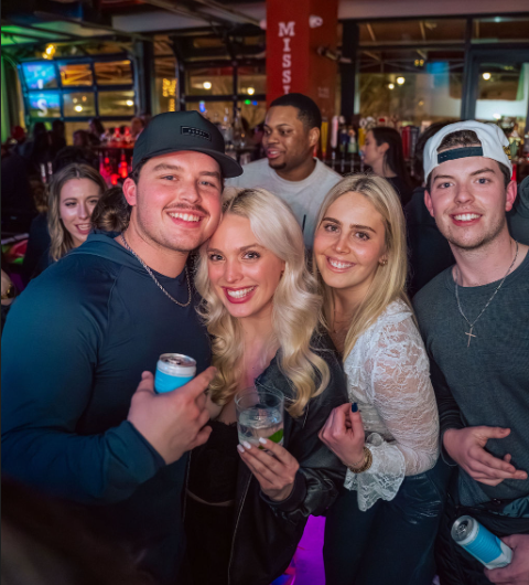 a group of people posing for the camera