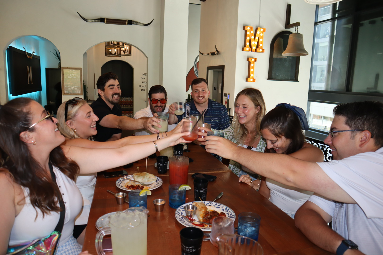a group of people sitting at a table