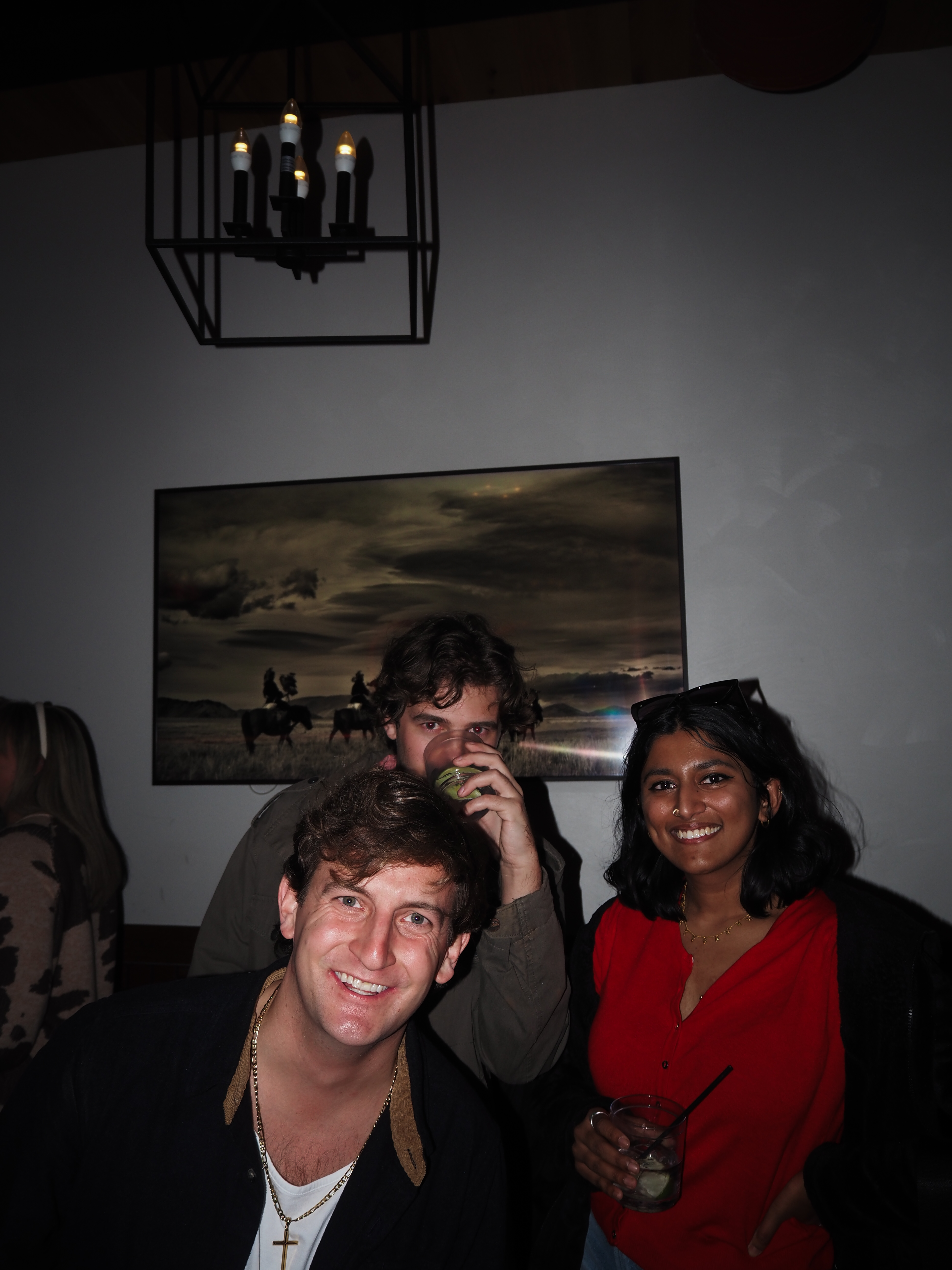 a group of people posing for the camera