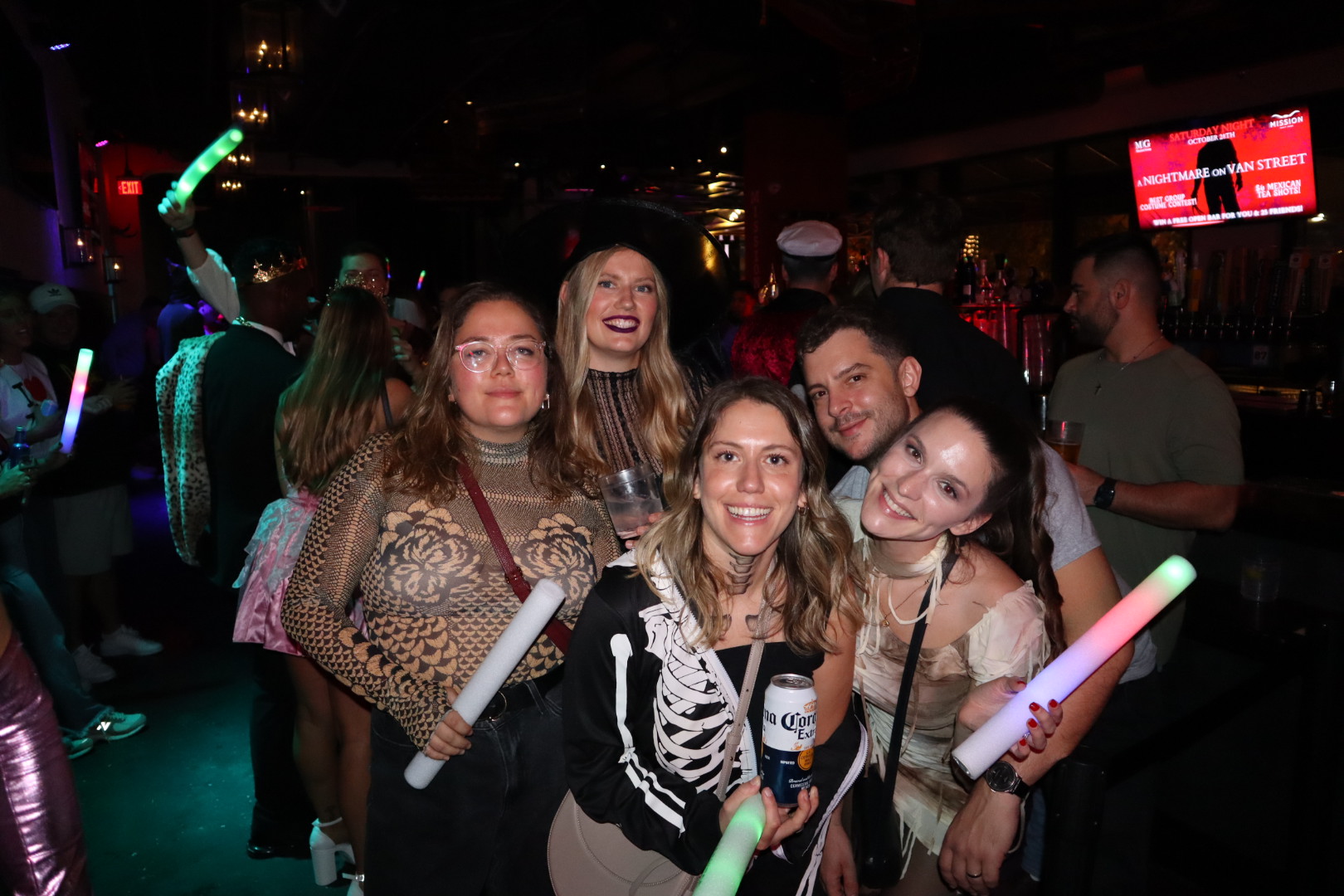 a group of people posing for the camera