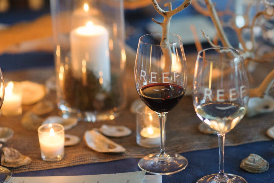 a table with wine glasses