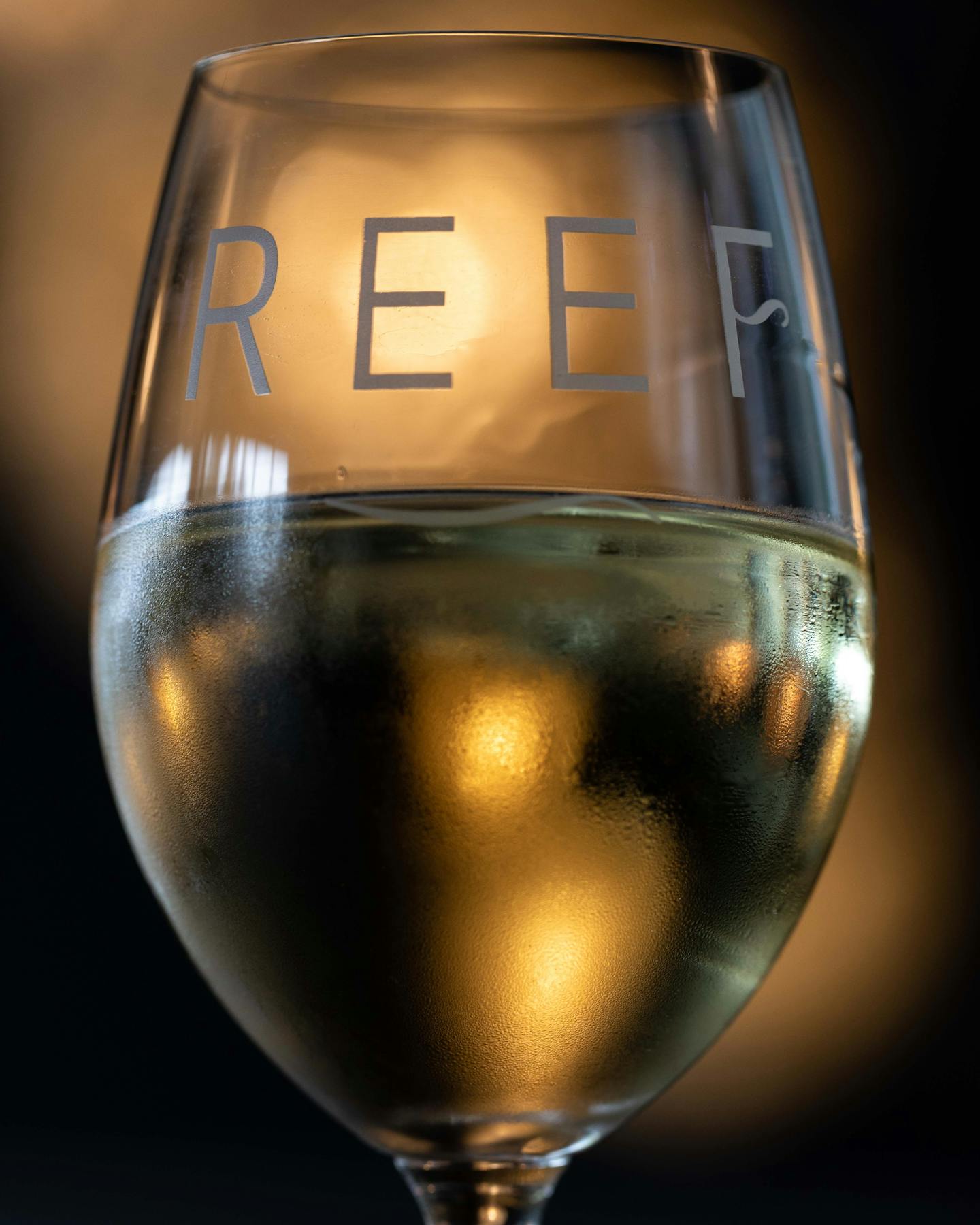 a close up of a wine glass