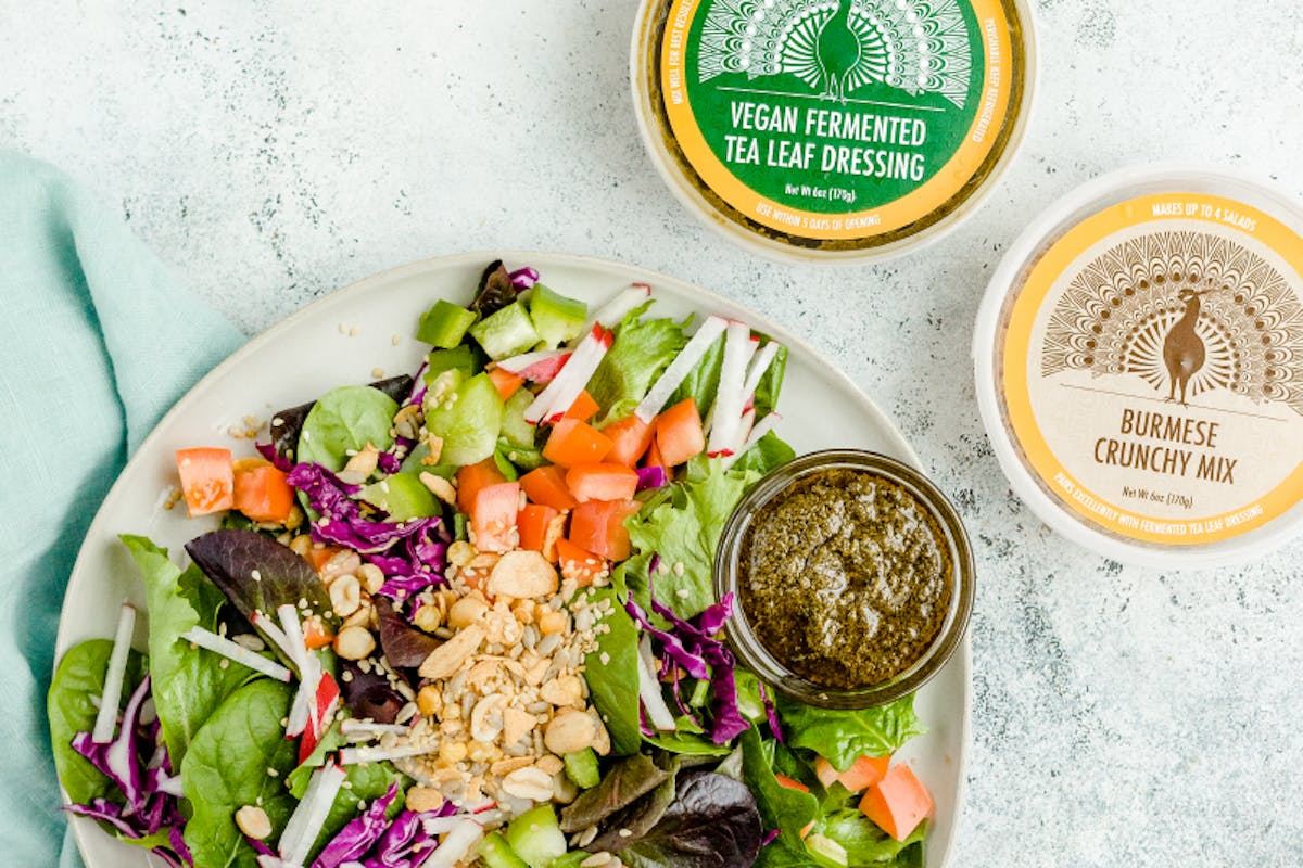 a bowl of salad on a plate